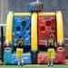 Michigan offensive linesman Taylor Lewan and offensive linesman Michael Schofield  play a blow up QB Blitz game during media day at Michigan Stadium on Sunday, August 11, 2013. Melanie Maxwell | AnnArbor.com